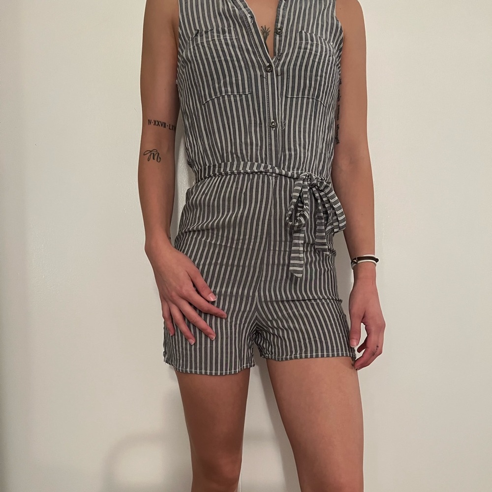 Striped button up romper. Very comfortable. Great condition. I have outgrown
